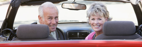 Senior Couple - in convertable looking back